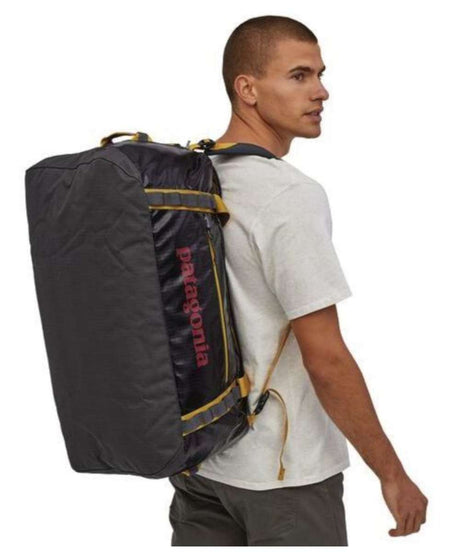 71198473_Patagonia Black Hole Duffel 55L smolder blue w/buckwheat gold