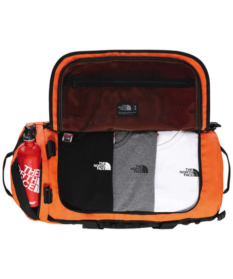 71158028_The North Face Base Camp Duffel M persian orange/tnf black